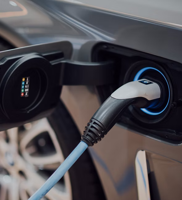 Electric vehicles at a charging station in an African city